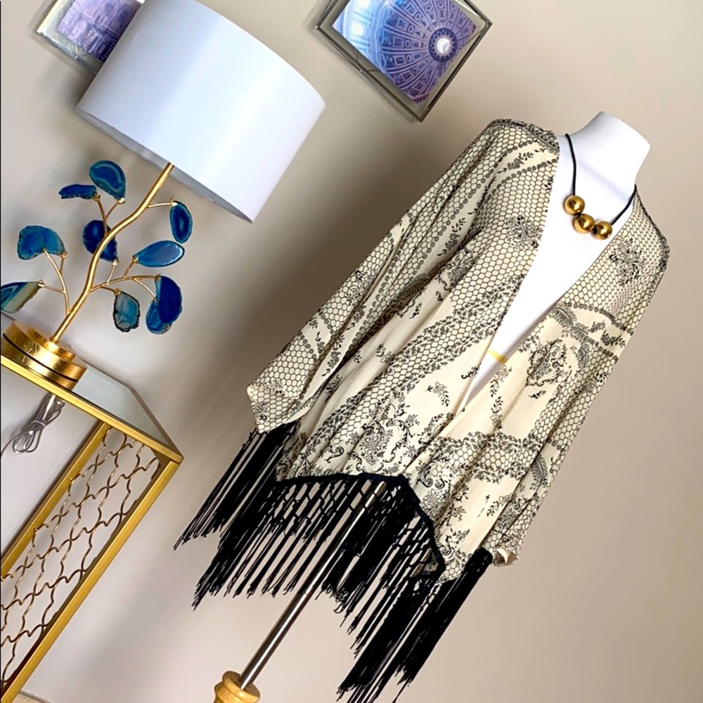 Beautiful duster in cream with black fringes